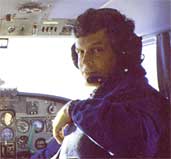 Bill Kruse flying aerial survey